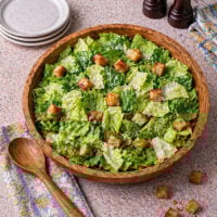 Caesar salad in wooden bowl
